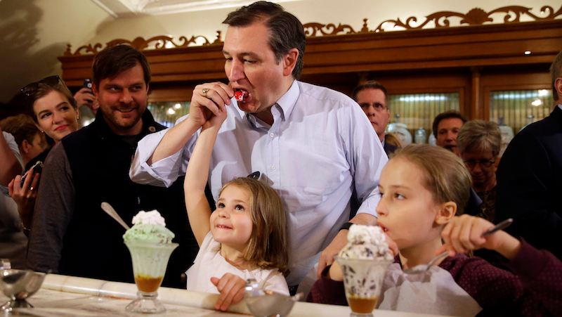And here he is sucking on a frothy cherry.